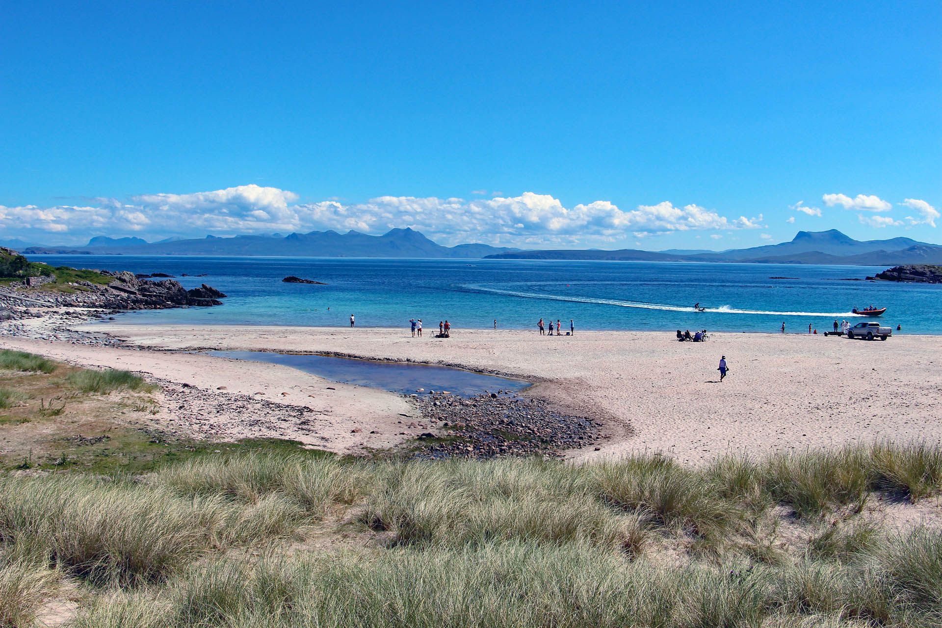 People enjoying the beach on Mellon Udrigle in Gairloch